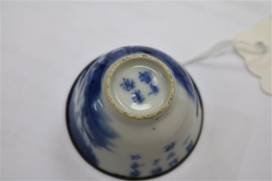 A small Chinese blue white inscribed teabowl, 19th century,
